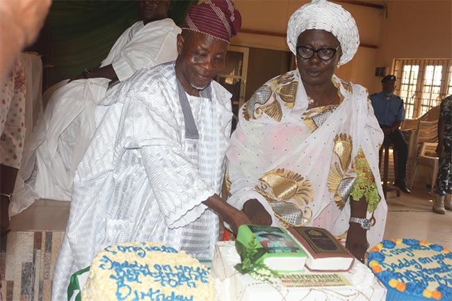 Prof. Balogun and wife, Alhaja Mistura Balogun, cutting the cake at his retirement ceremony
